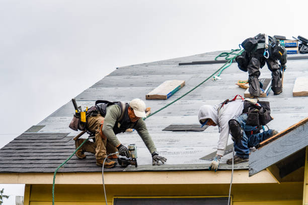 Professional Gutter Installation technician working in Fairview, OR